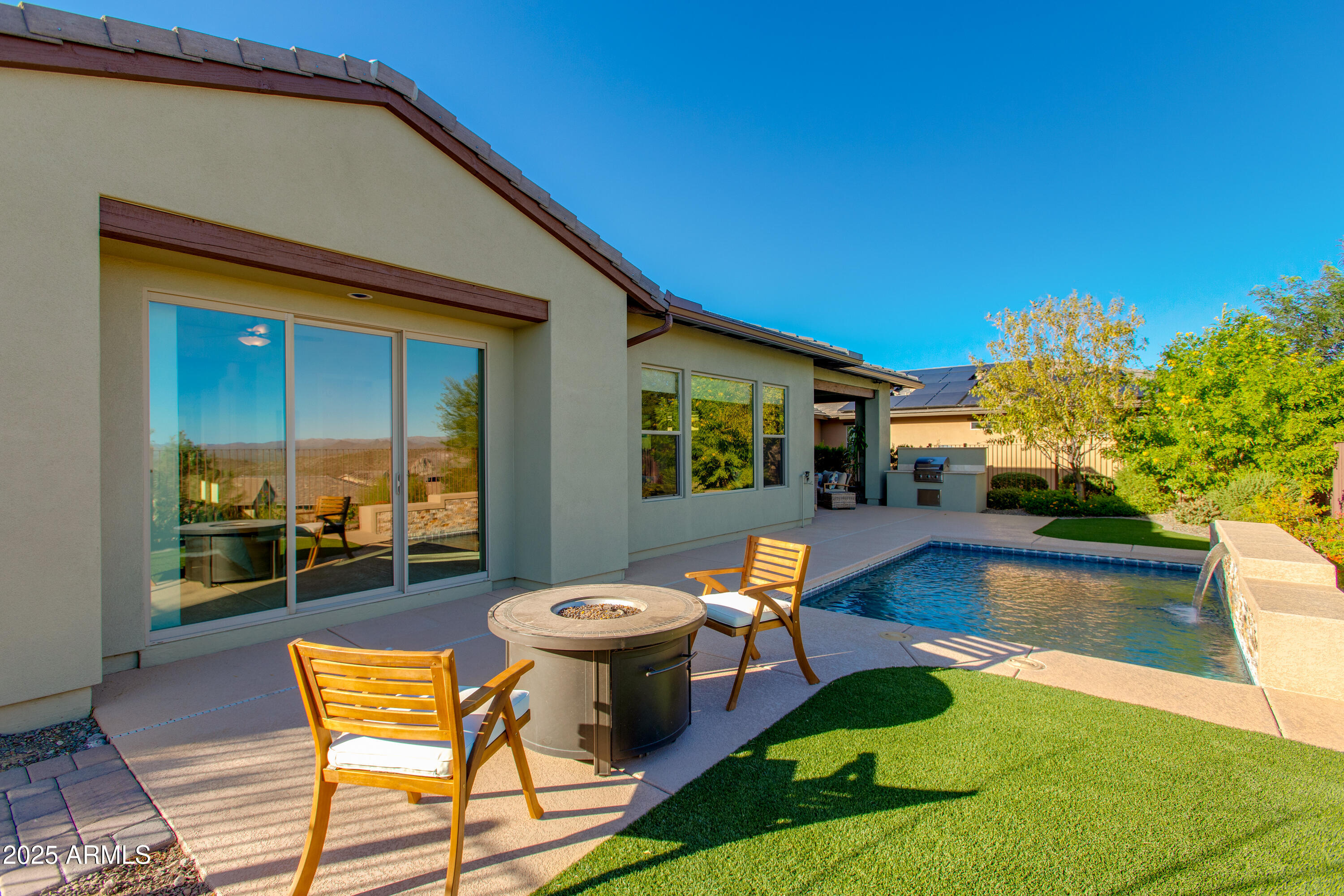 3675 Gold Ridge Road Wickenburg, AZ 85390 - Photo 61 of 66 a view of a backyard with furniture and garden