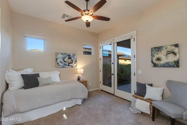 a bathroom with a granite countertop sink mirror and shower