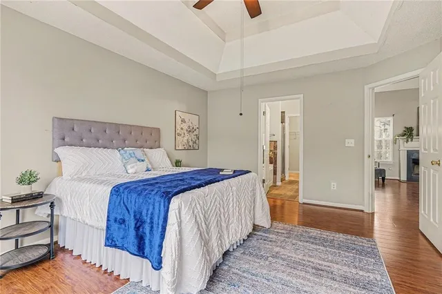 a bedroom with a bed and a table