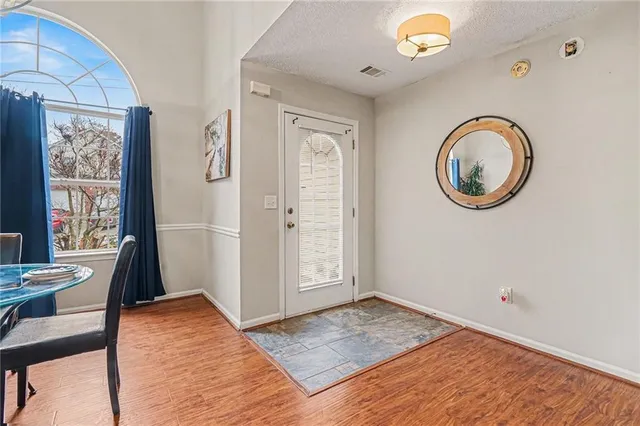 a view of livingroom with furniture wooden floor and window