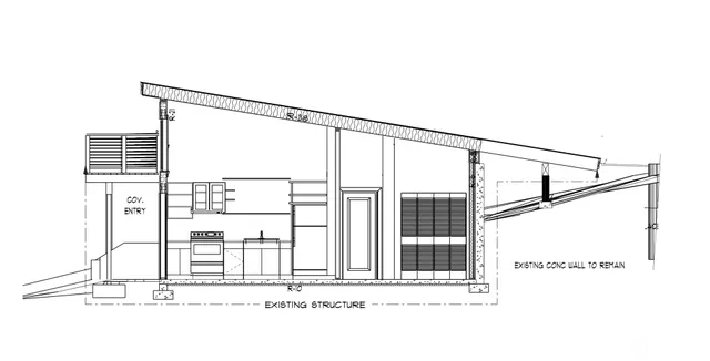 a black and white photo of a very nice looking living room