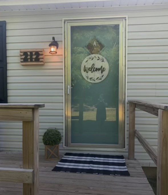 212 Cherry Street Ethridge, TN 38456 - Photo 2 of 12 a view of wooden door