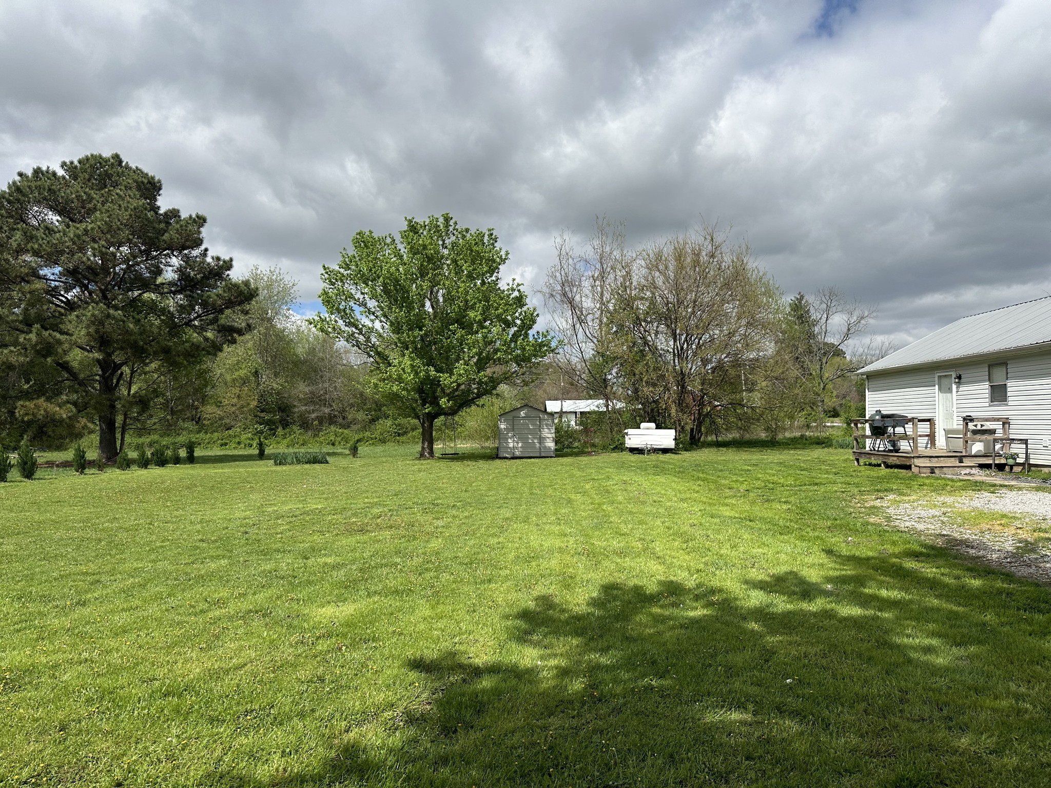 212 Cherry Street Ethridge, TN 38456 - Photo 10 of 12 a fire hydrant in the middle of a field