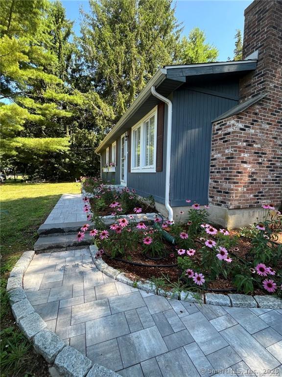 Undisclosed Address Old Lyme, CT 06371 - Photo 1 of 1 a view of a house with a yard
