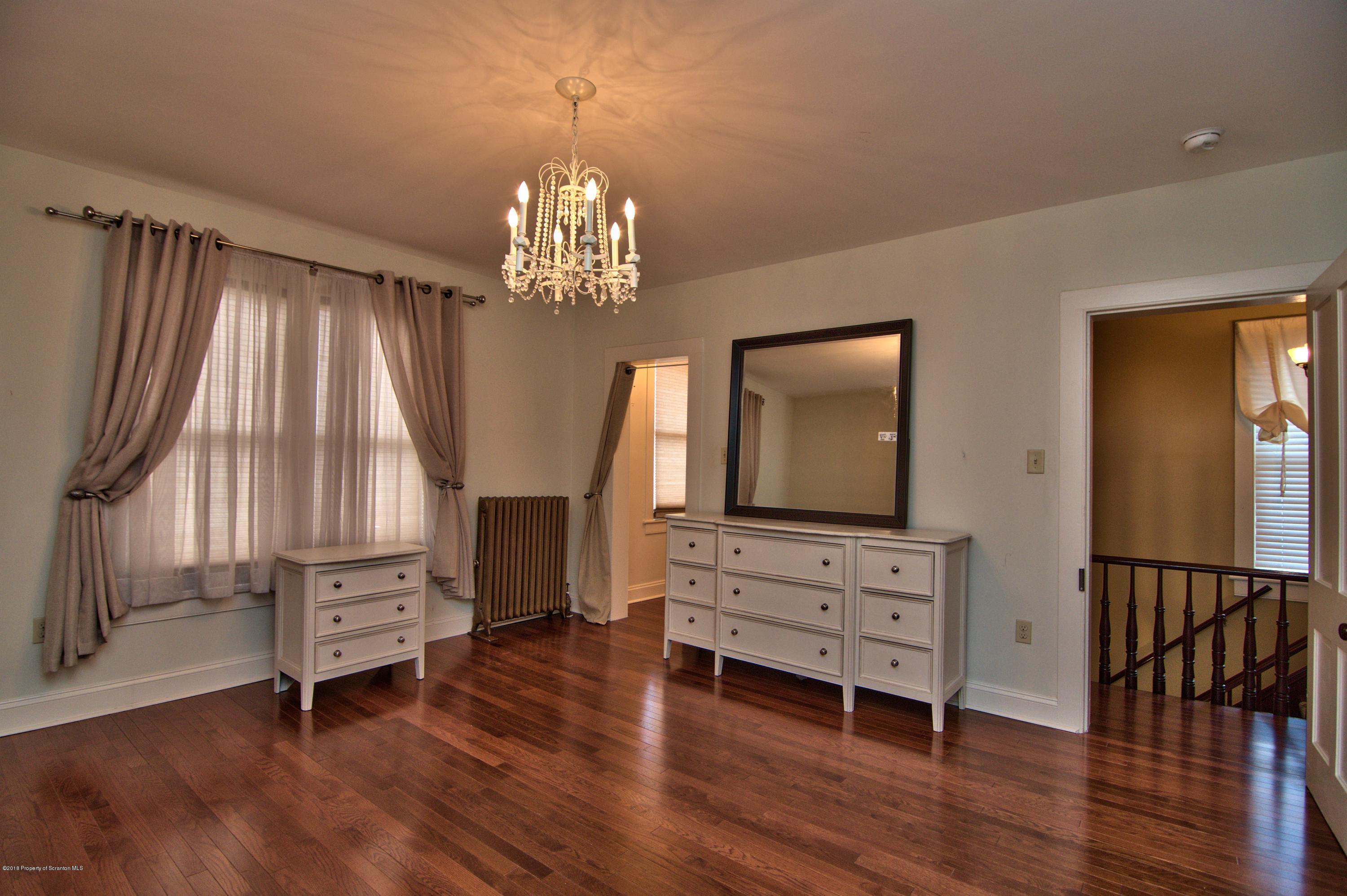 754 Green Ridge Street Scranton, PA 18509 - Photo 11 of 77 a view of livingroom with hardwood floor and a ceiling fan