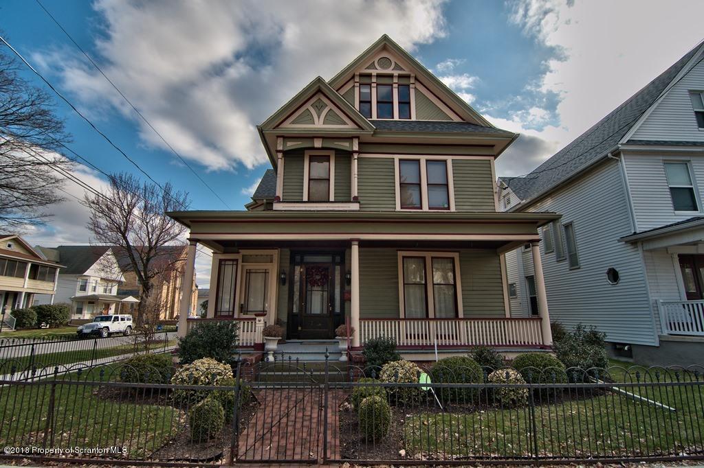 754 Green Ridge Street Scranton, PA 18509 - Photo 17 of 77 a front view of a house with a yard