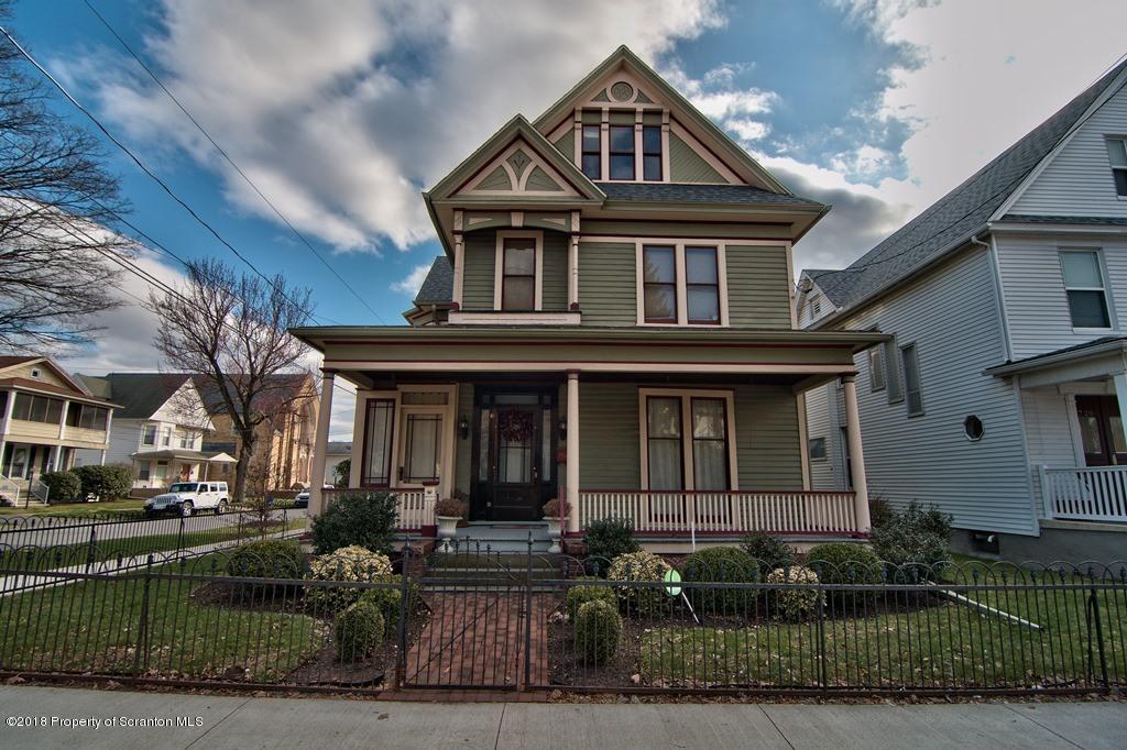 754 Green Ridge Street Scranton, PA 18509 - Photo 19 of 77 a front view of a house with a yard