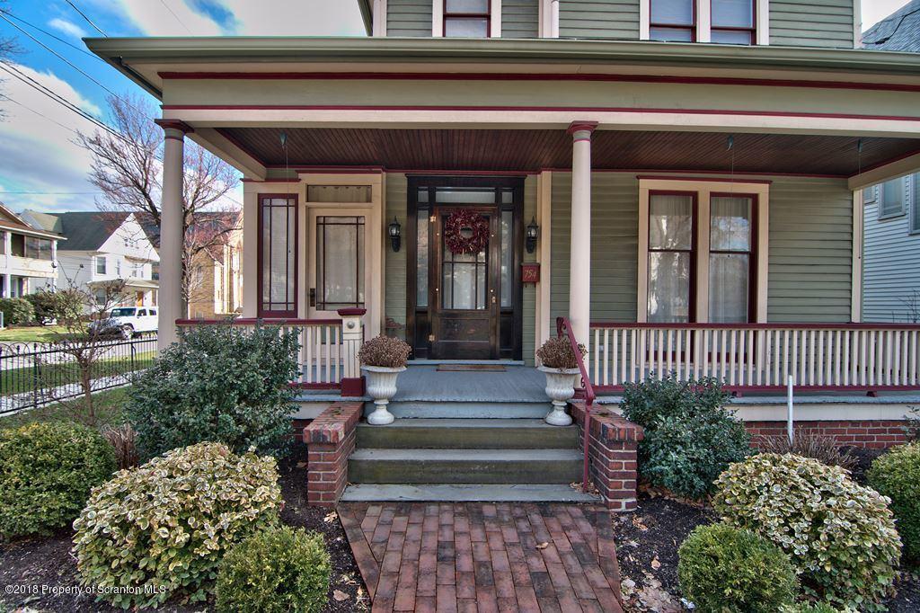 754 Green Ridge Street Scranton, PA 18509 - Photo 21 of 77 a front view of a house with a garden