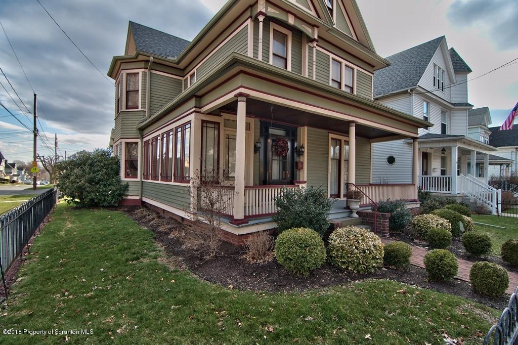 754 Green Ridge Street Scranton, PA 18509 - Photo 22 of 77 a front view of a house with a yard