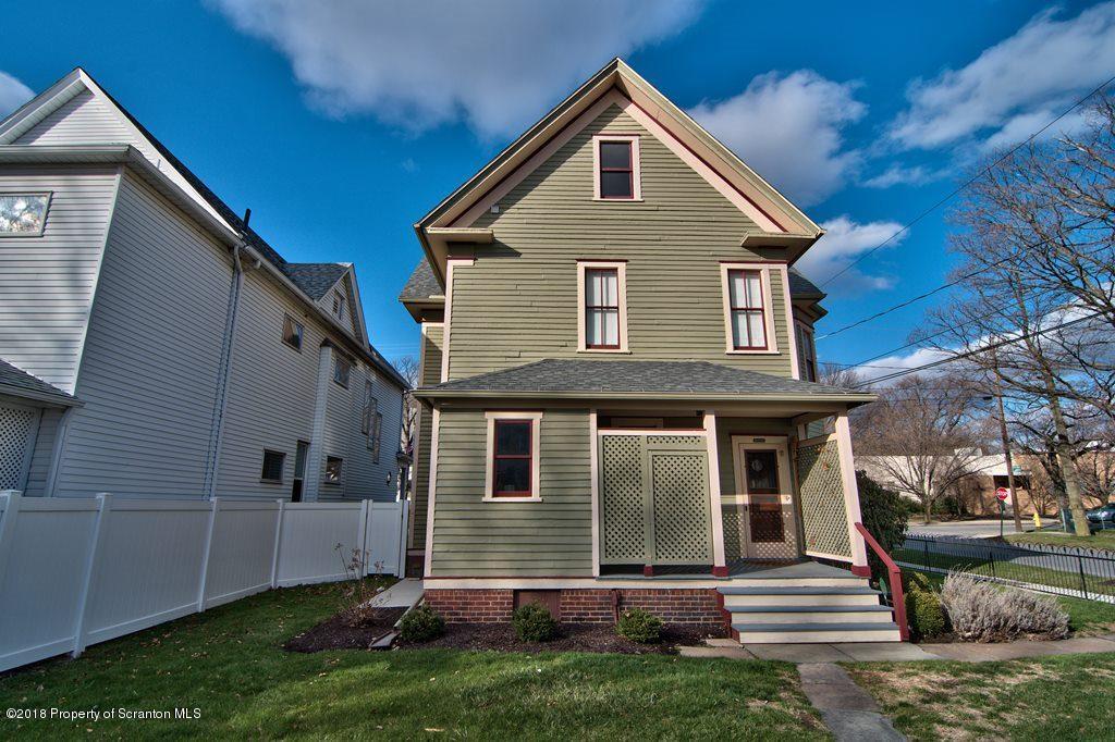 754 Green Ridge Street Scranton, PA 18509 - Photo 27 of 77 a front view of a house with a yard