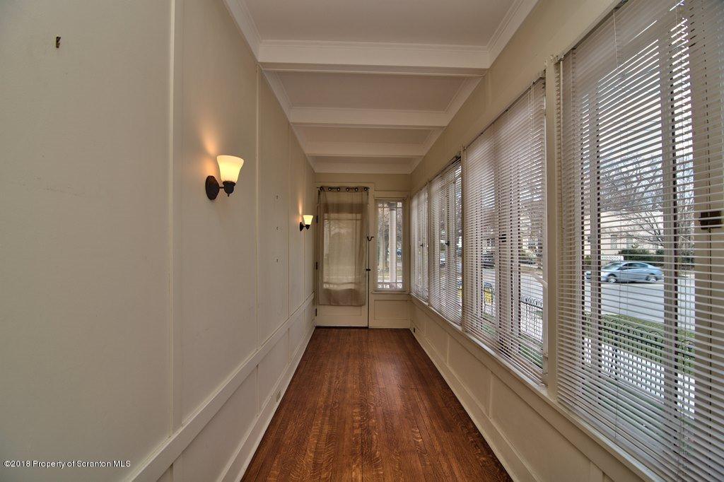 754 Green Ridge Street Scranton, PA 18509 - Photo 43 of 77 a view of a hallway with wooden floor