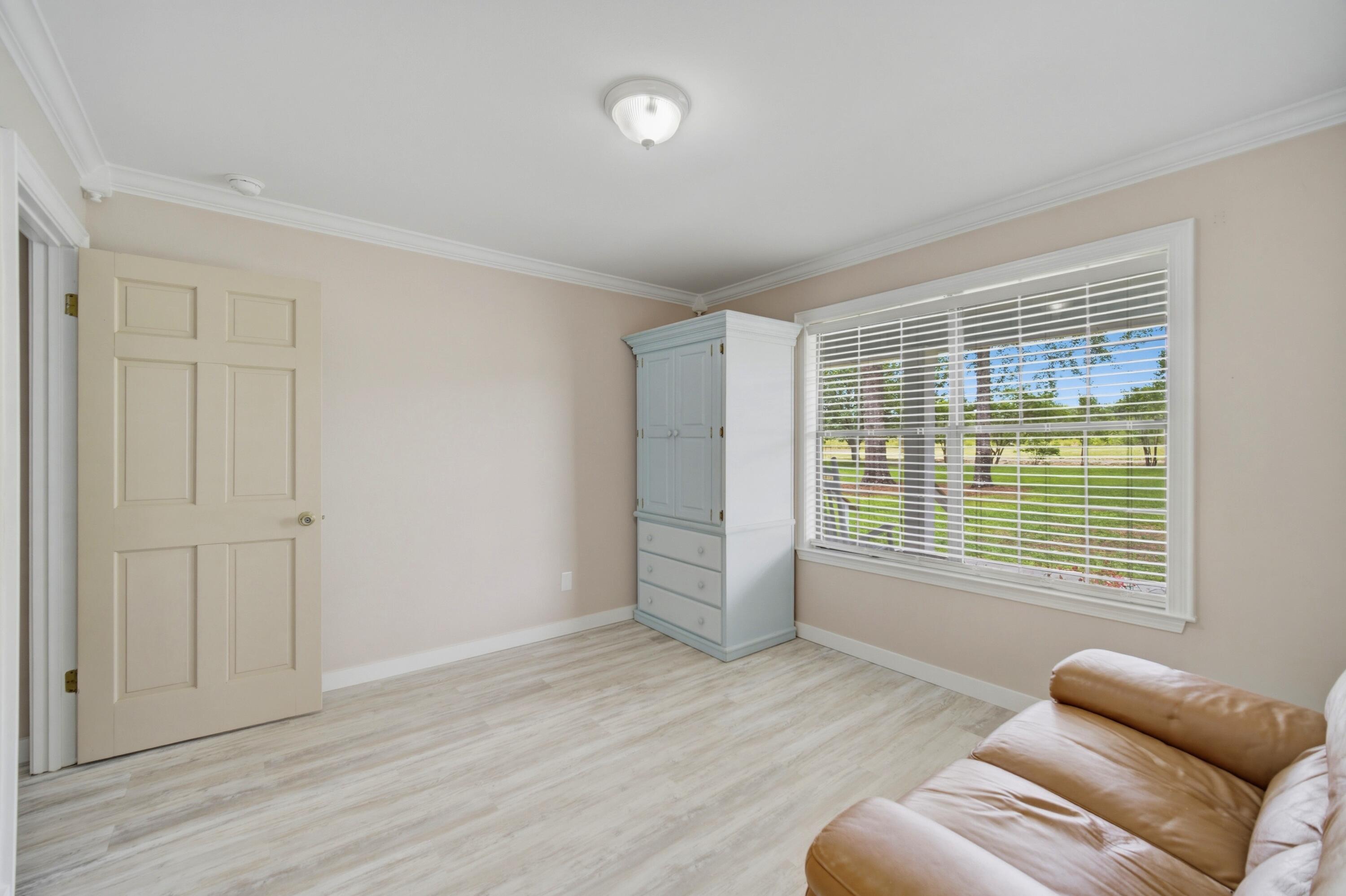 261 Wilkerson Road DeFuniak Springs, FL 32433 - Photo 49 of 76 a view of livingroom with furniture and a window