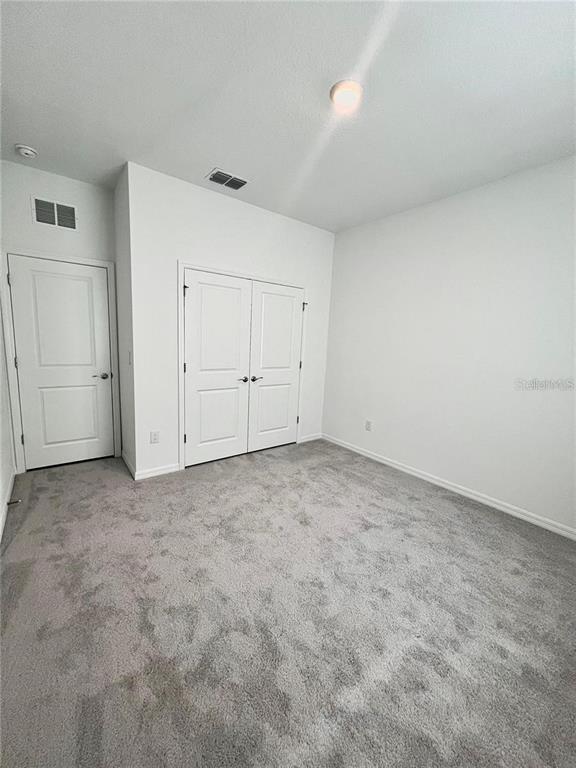 2373 Bending Bonsai Drive Wesley Chapel, FL 33543 - Photo 18 of 29 a view of an empty room