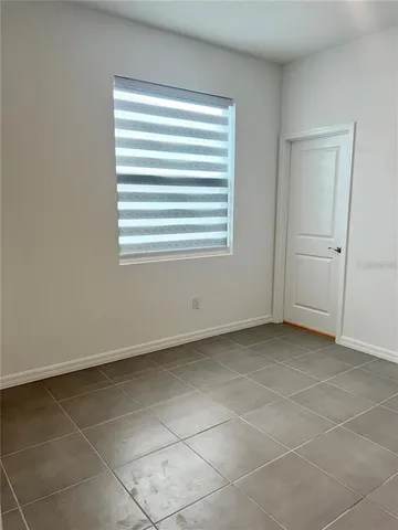 a view of a room that has a window in it