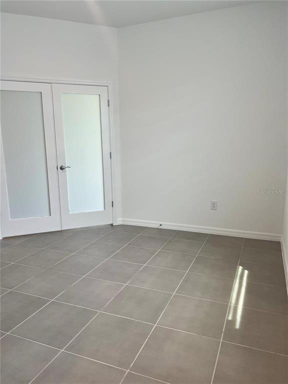 2373 Bending Bonsai Drive Wesley Chapel, FL 33543 - Photo 20 of 29 a view of a room with an empty space and window