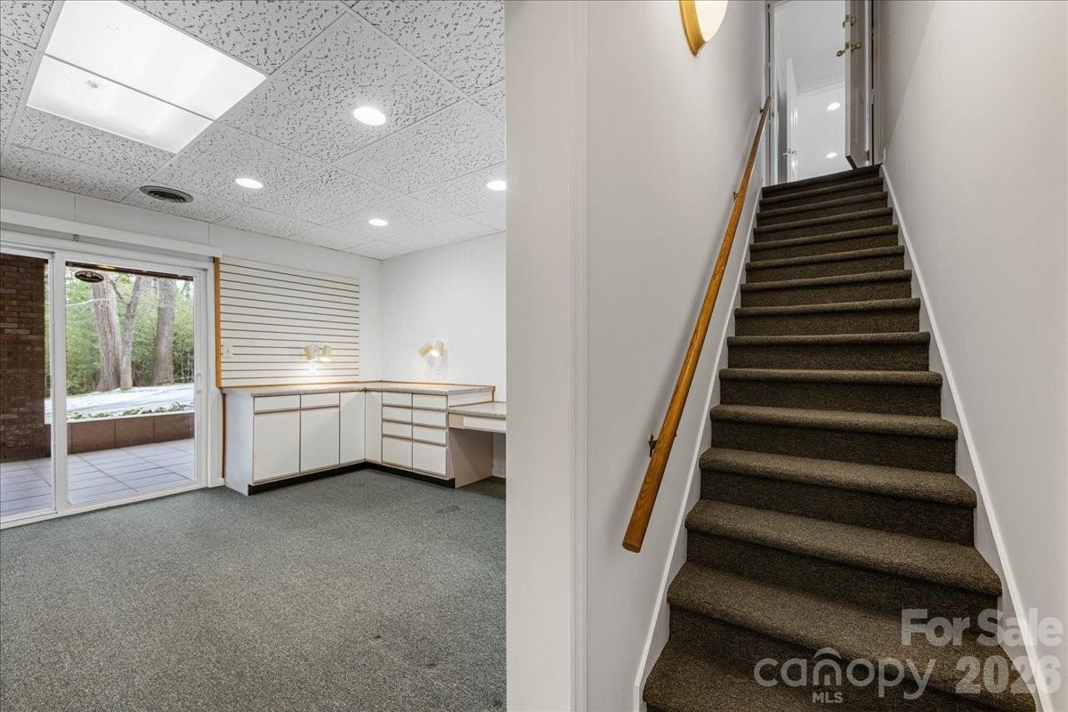7201 Terrace Drive Charlotte, NC 28211 - Photo 42 of 48 a view of entryway and hall with wooden floor