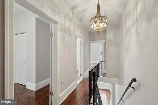 a view of entryway with chandelier