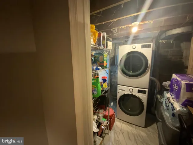 a bathroom with a sink toilet and mirror