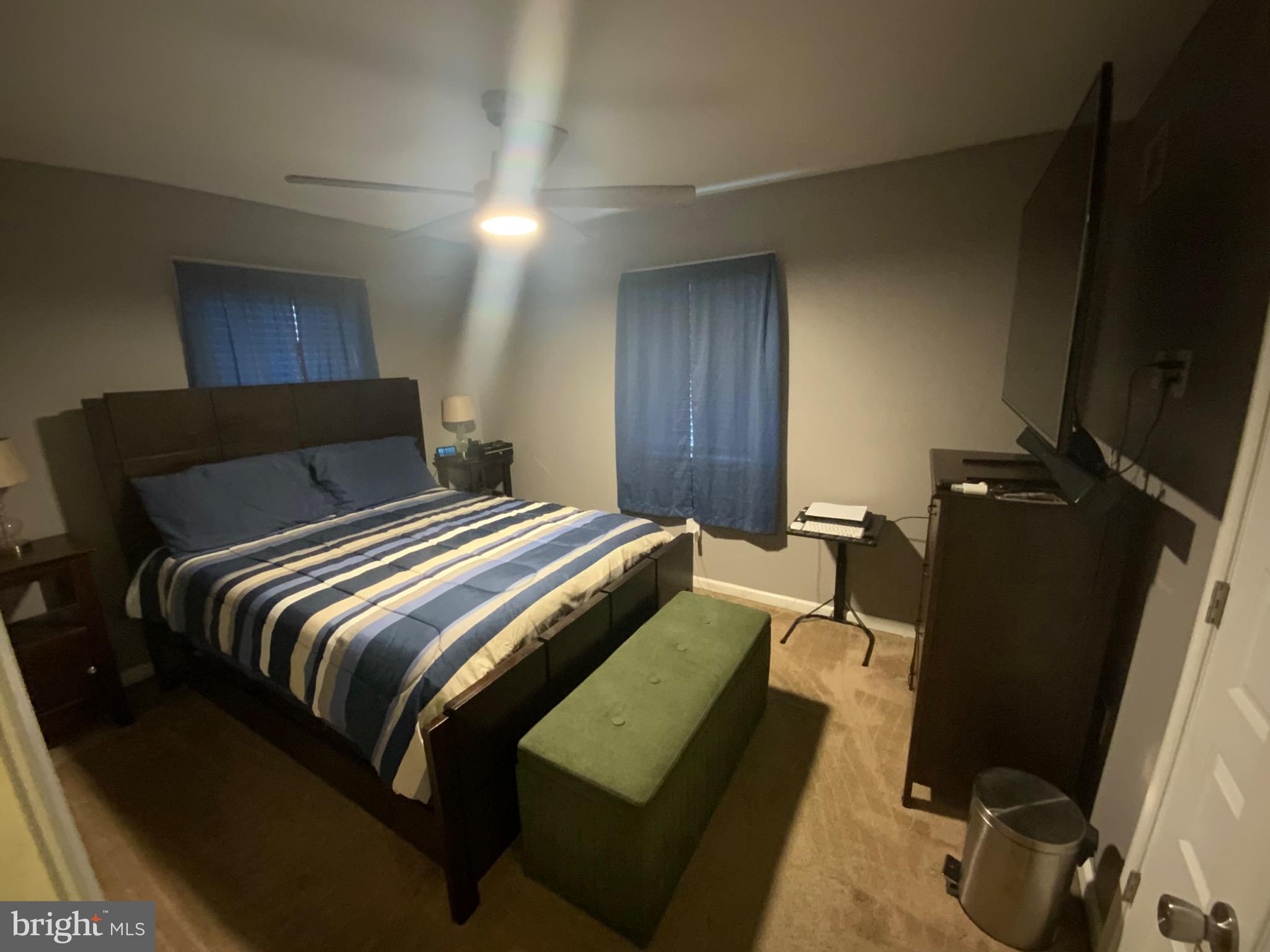 540 Lebaum Street Southeast Washington, DC 20032 - Photo 23 of 25 a bedroom with a bed and a mirror