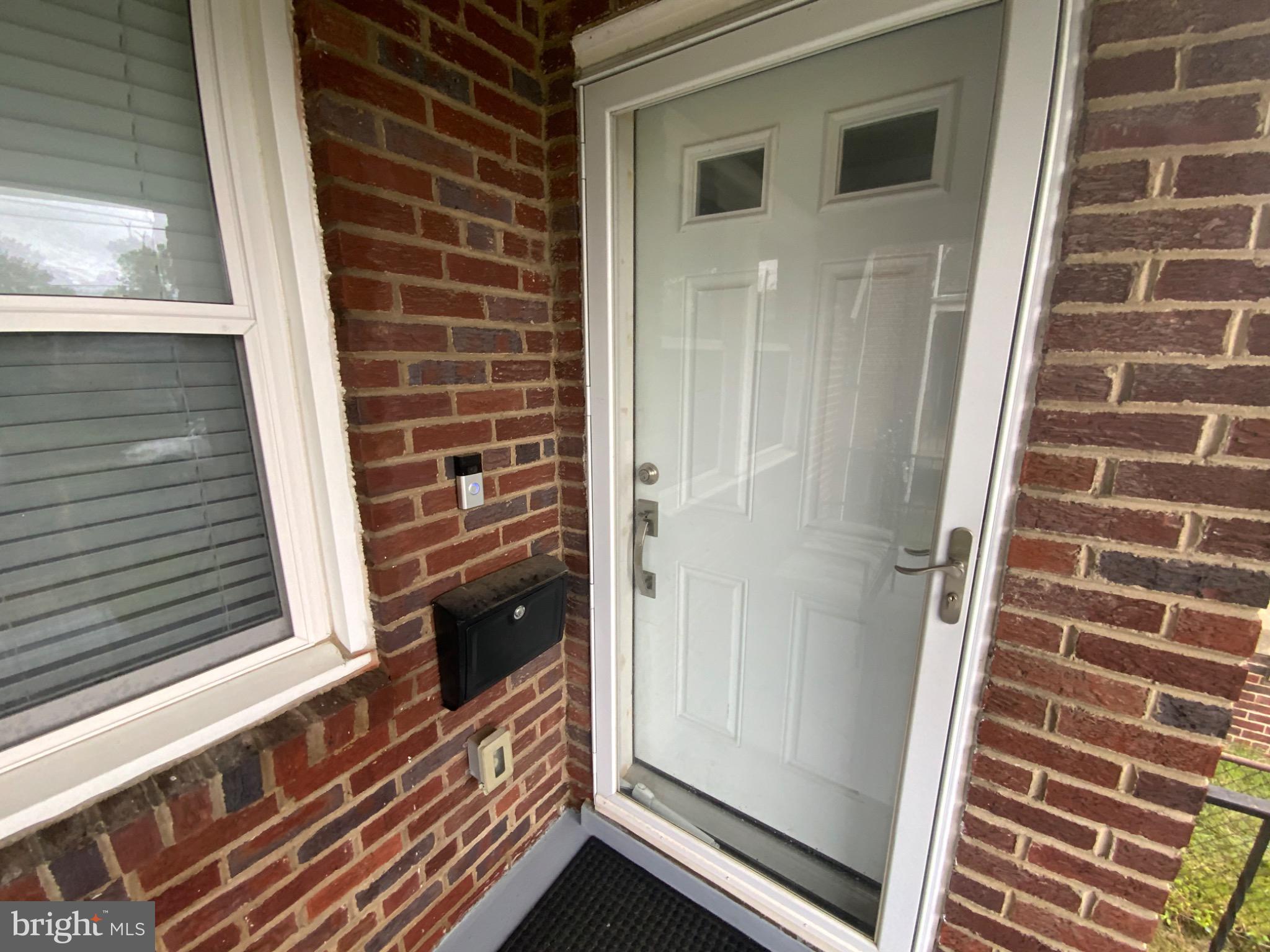 540 Lebaum Street Southeast Washington, DC 20032 - Photo 3 of 25 a view of front door and porch