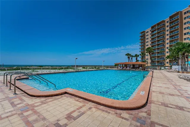 a view of swimming pool from a balcony