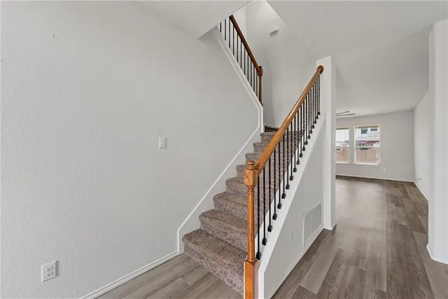 a view of entryway with wooden floor