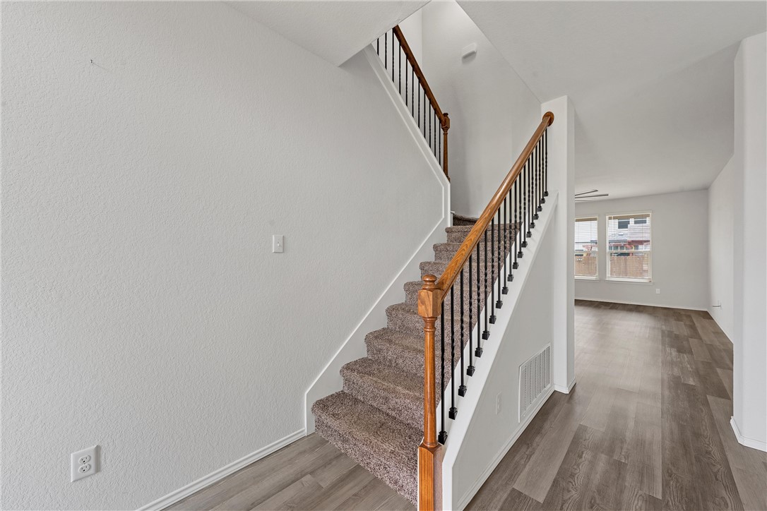 11208 Echo Drive Waco, TX 76708 - Photo 14 of 34 a view of entryway with wooden floor