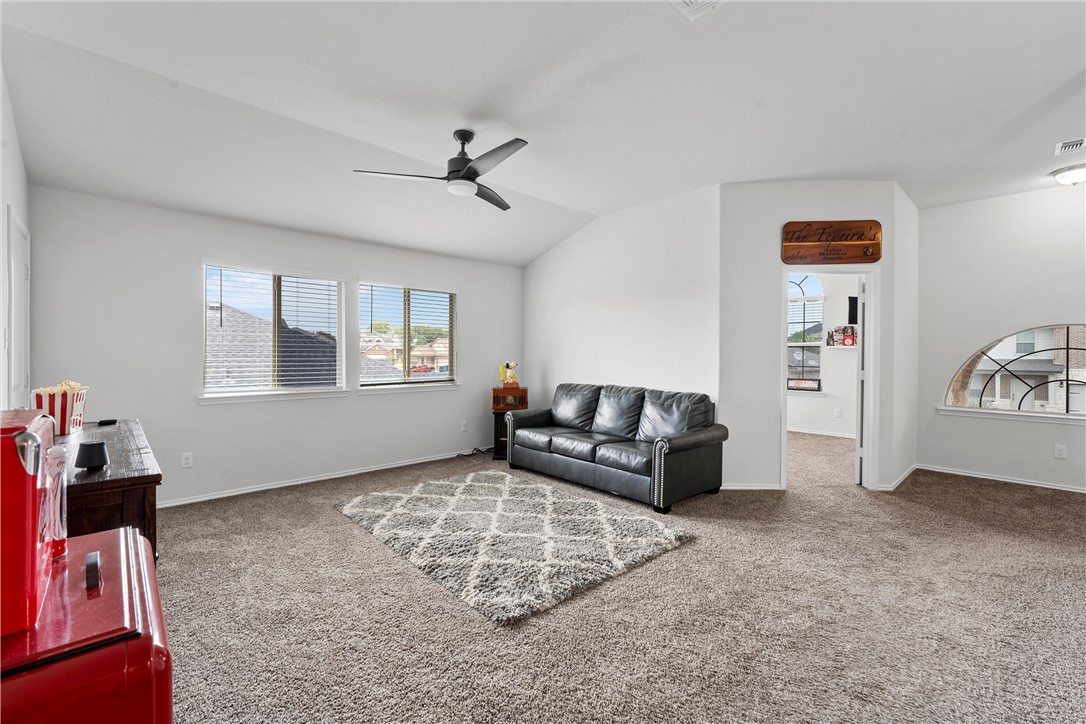 11208 Echo Drive Waco, TX 76708 - Photo 23 of 34 a living room with furniture and a window
