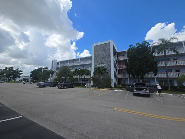 a view of a street with cars