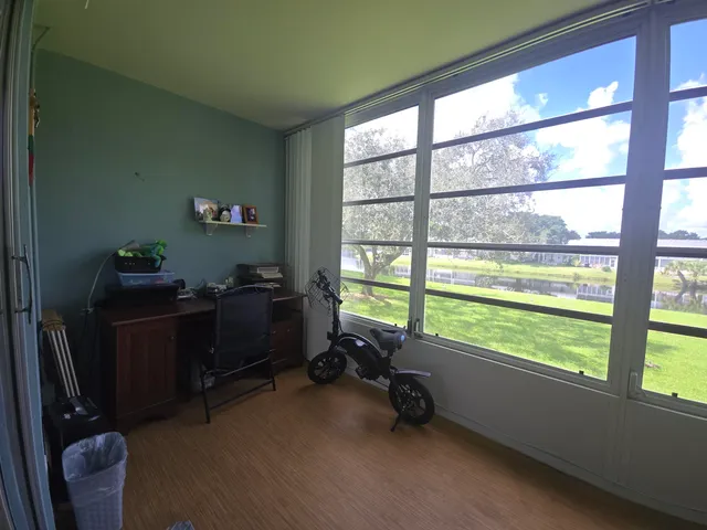 a room with furniture and a window