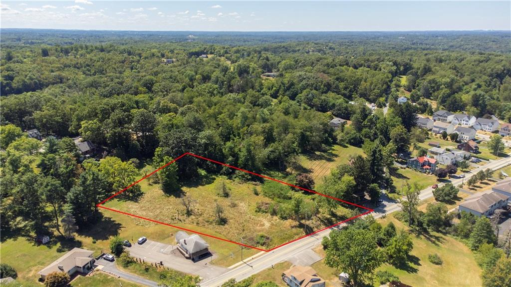 2425 Rochester Road Sewickley, PA 15143 - Photo 2 of 8 an aerial view of a forest with houses