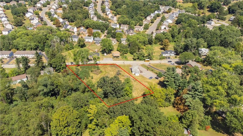 2425 Rochester Road Sewickley, PA 15143 - Photo 4 of 8 a view of a yard with a tree