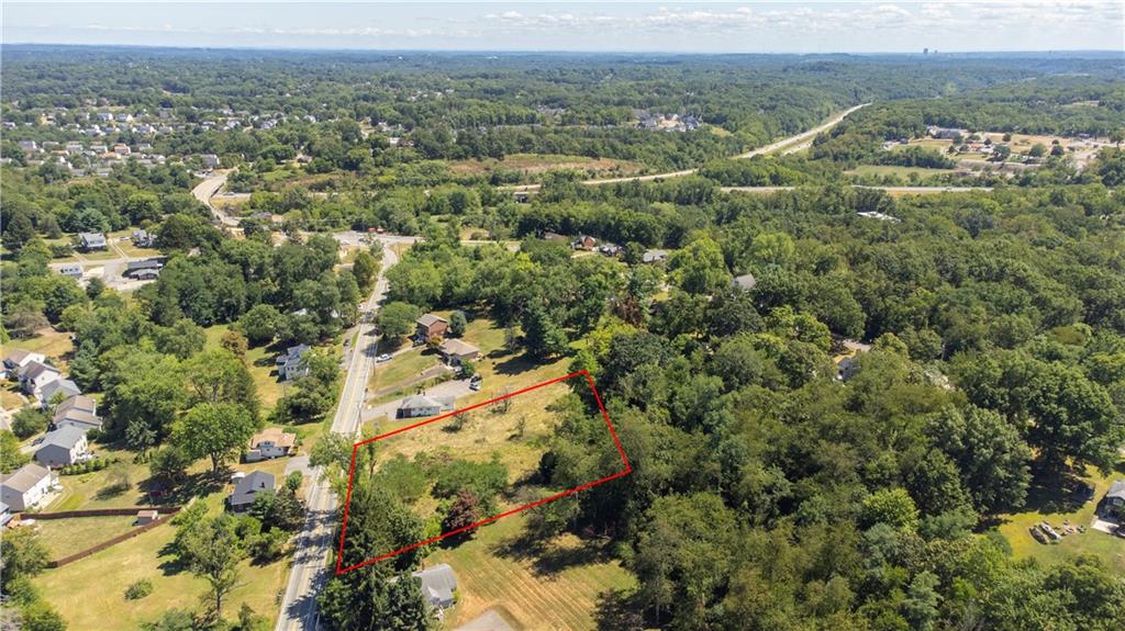 2425 Rochester Road Sewickley, PA 15143 - Photo 5 of 8 an aerial view of residential houses with outdoor space and trees
