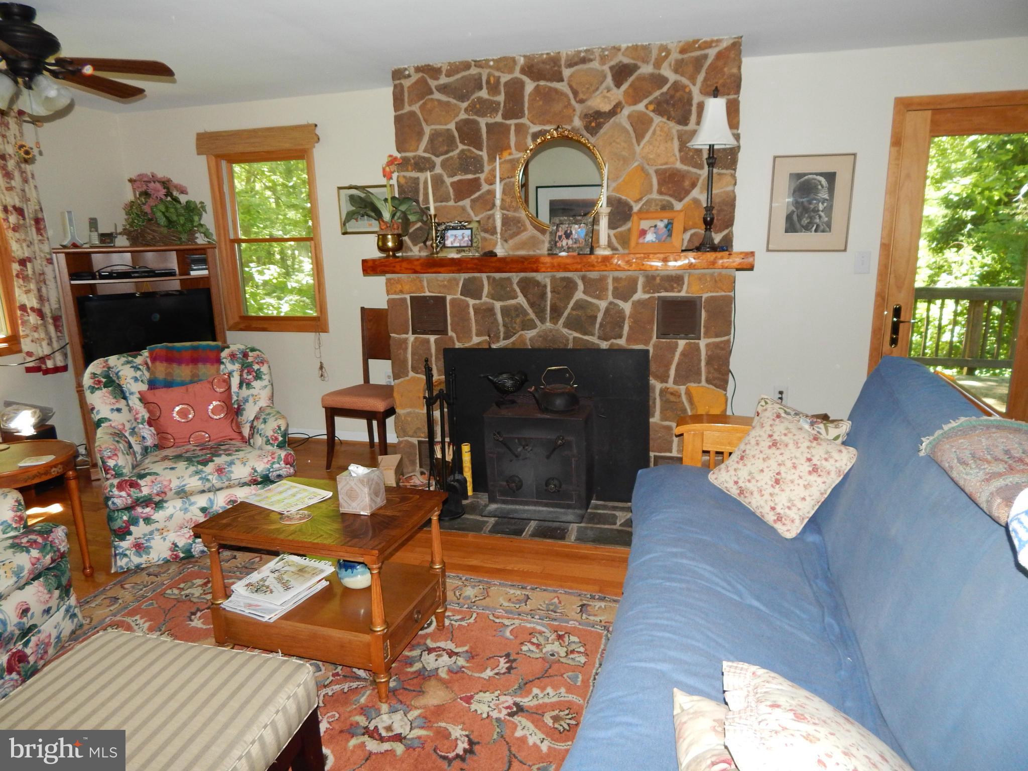 2387 Acacia Road Port Republic, MD 20676 - Photo 3 of 20 Living Room with stone fireplace!