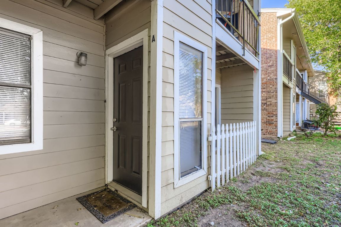 2005 West Loop, Unit A Austin, TX 78758 - Photo 11 of 11 a view of a porch with a door