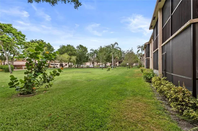 a view of a garden with an buildings