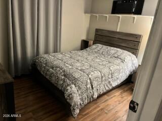 146 North Merrill Road, Unit 73 Apache Junction, AZ 85120 - Photo 17 of 19 a bed sitting in a bedroom next to a window