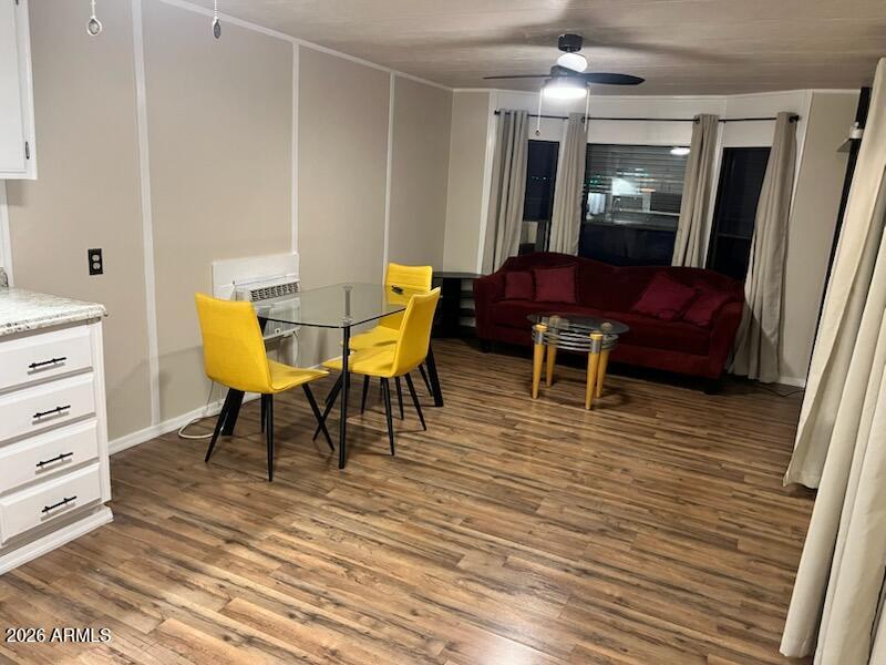 146 North Merrill Road, Unit 73 Apache Junction, AZ 85120 - Photo 18 of 19 a view of a dining room with furniture