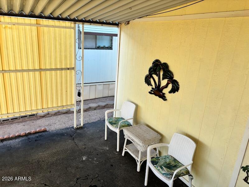 146 North Merrill Road, Unit 73 Apache Junction, AZ 85120 - Photo 8 of 19 a view of workspace and bedroom