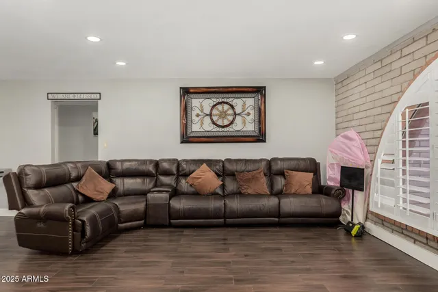 a living room with furniture and a couch