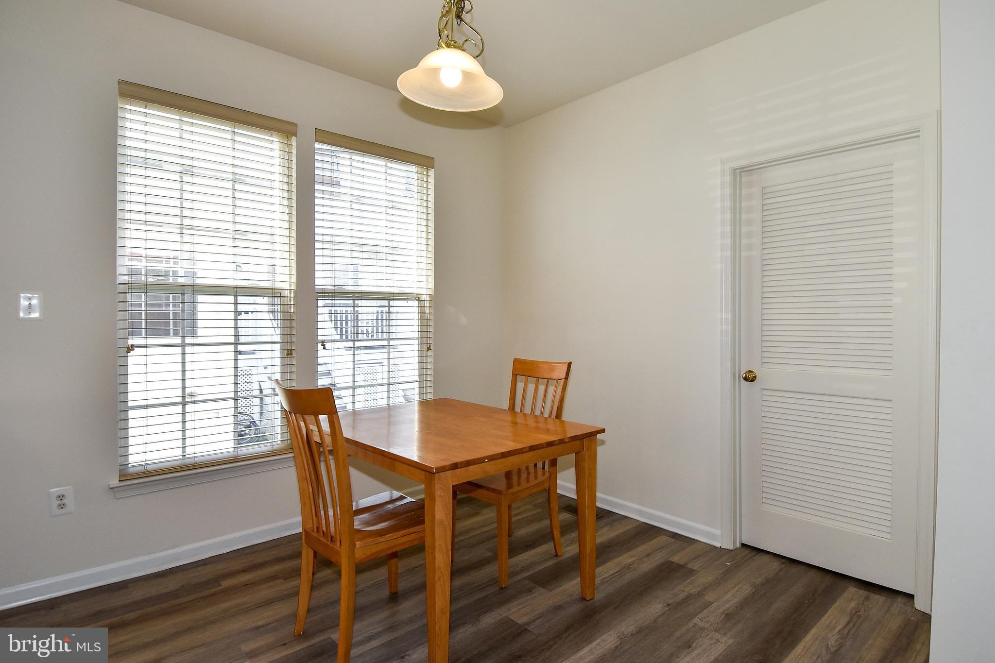 7828 Callington Way Hanover, MD 21076 - Photo 11 of 41 BREAKFAST ROOM DOOR ACCESS TO LAUNDRY ROOM