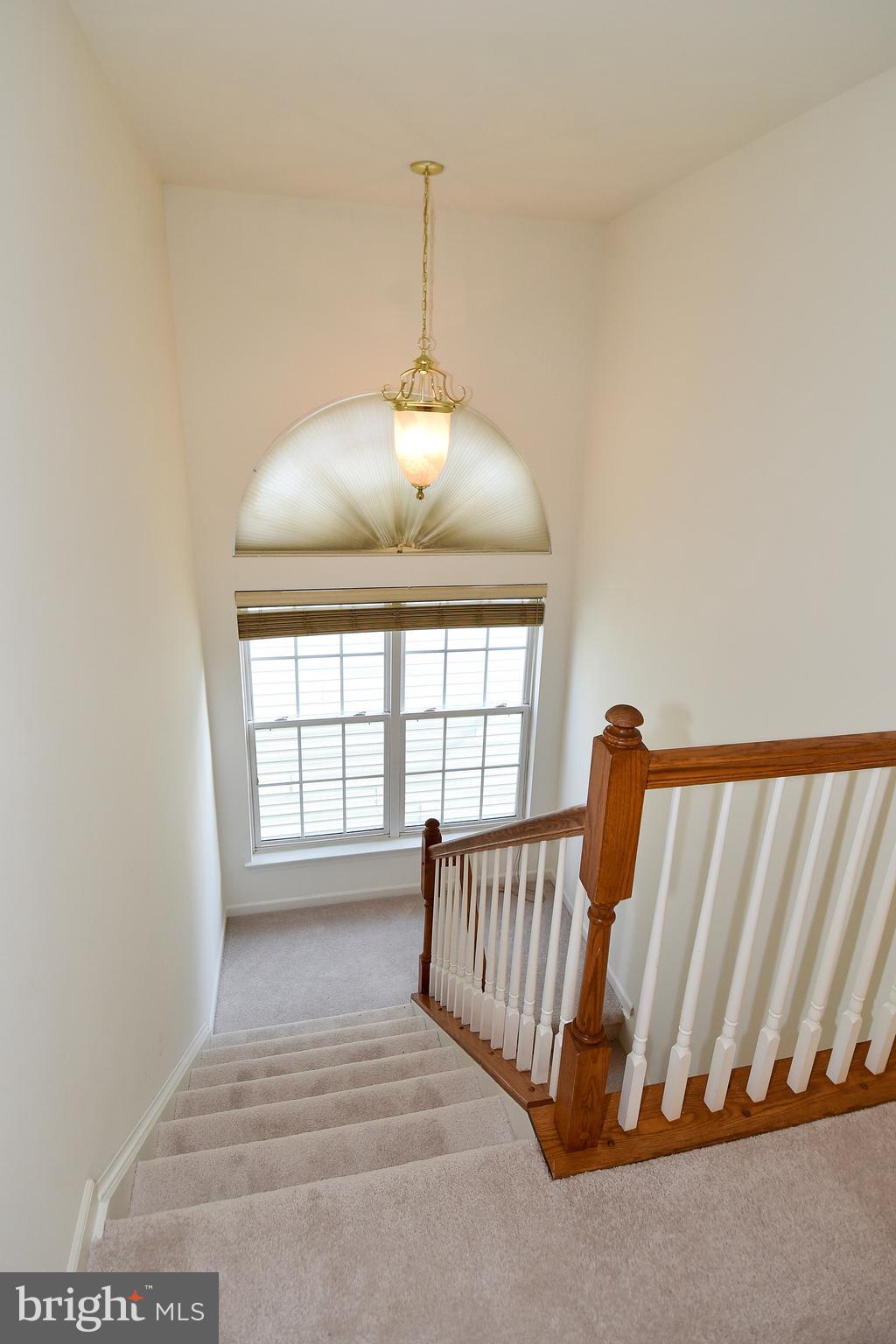 7828 Callington Way Hanover, MD 21076 - Photo 18 of 41 UPPER LEVEL STAIRWELL