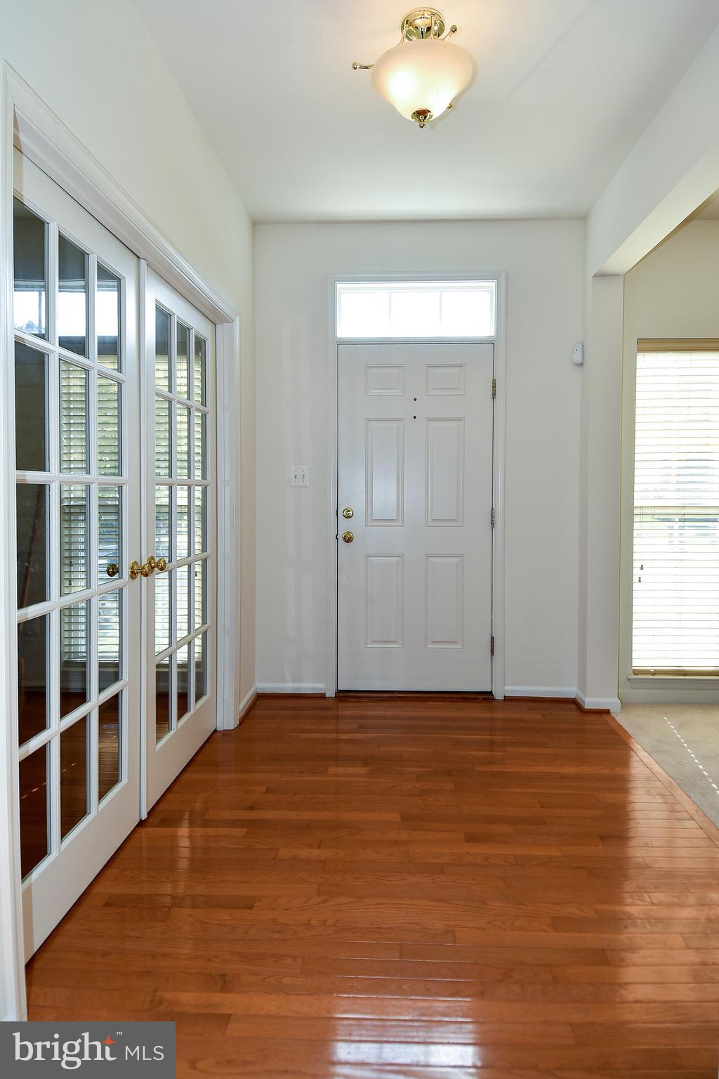 7828 Callington Way Hanover, MD 21076 - Photo 3 of 41 FOYER AND LEFT FRENCH DOORS ACCESS OFFICE