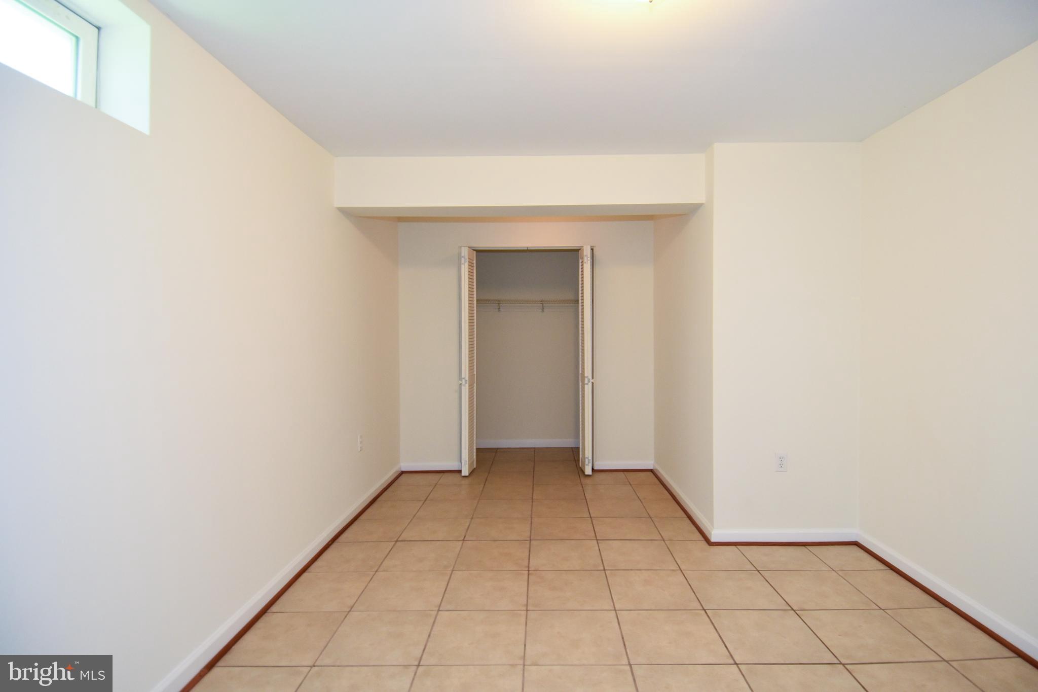 7828 Callington Way Hanover, MD 21076 - Photo 34 of 41 LOWER LEVEL HAS TILED FLOORING
