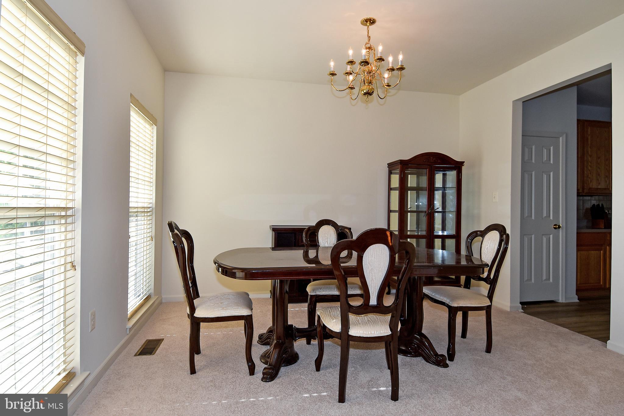 7828 Callington Way Hanover, MD 21076 - Photo 6 of 41 MAIN LEVEL DINING ROOM OFF FOYER