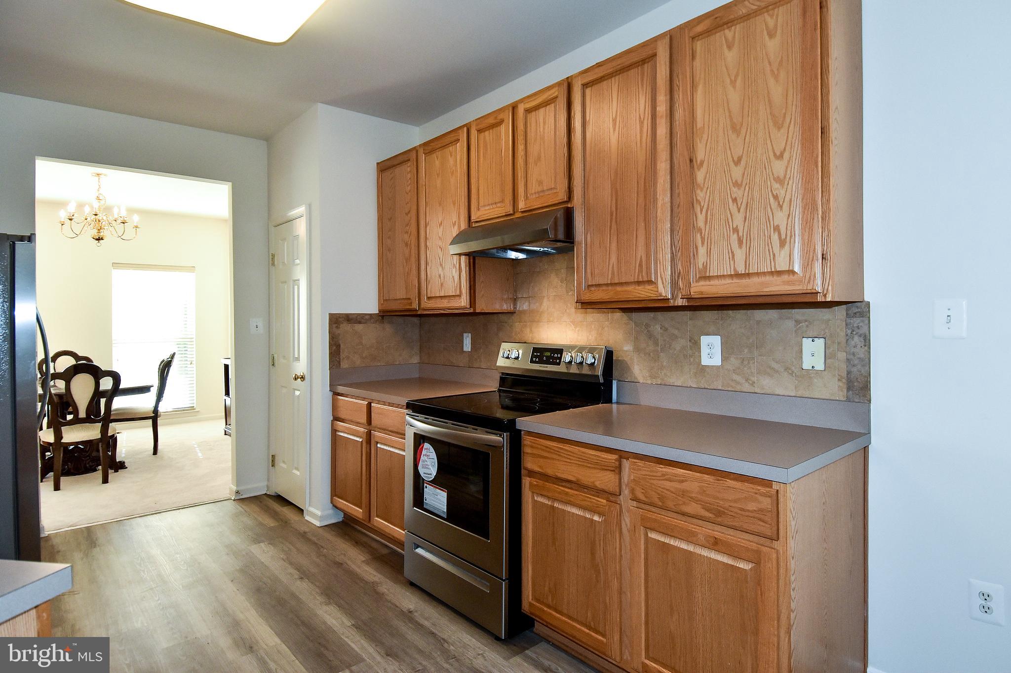 7828 Callington Way Hanover, MD 21076 - Photo 8 of 41 KITCHEN OFF DINING ROOM