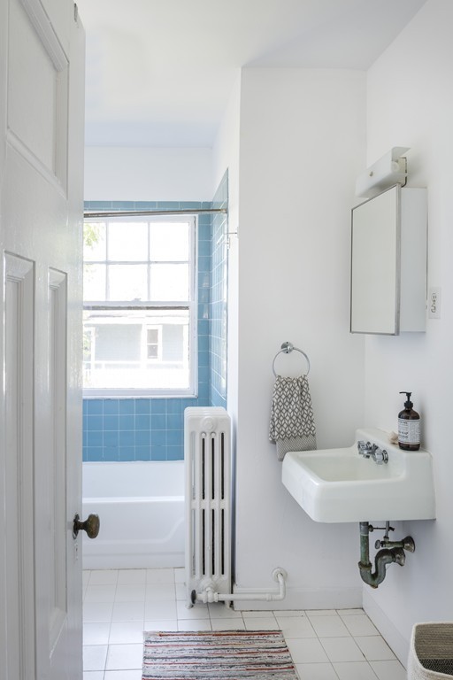 73-75 Upland Road Cambridge, MA 02140 - Photo 21 of 26 a bathroom with a sink a toilet and a bathtub