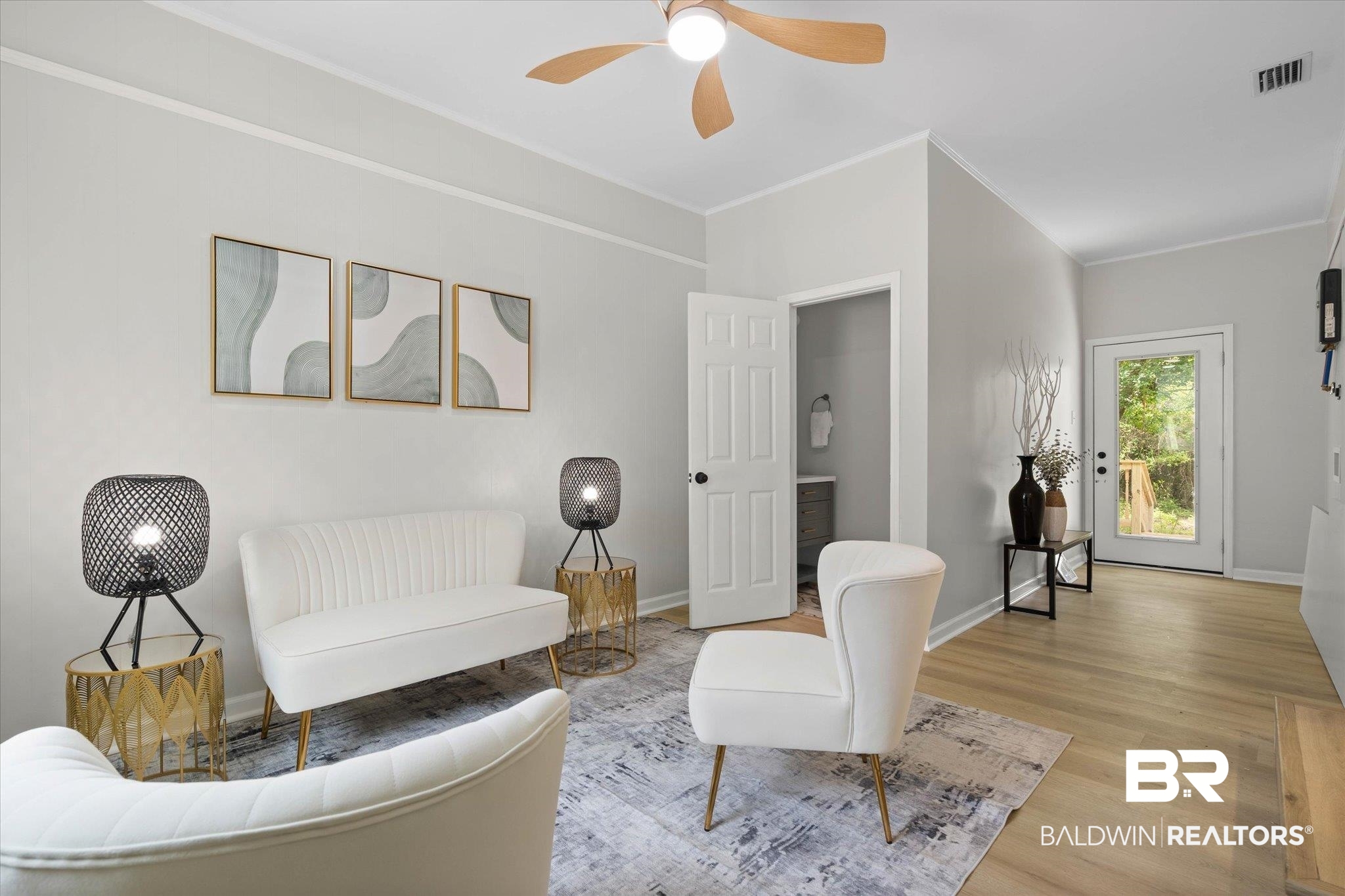 3512 Spring Hill Avenue Mobile, AL 36608 - Photo 10 of 20 Living room featuring light wood finished floors, ceiling fan, and ornamental molding