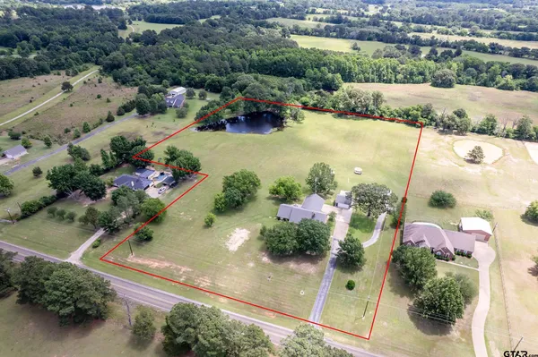an aerial view of lake residential house with outdoor space