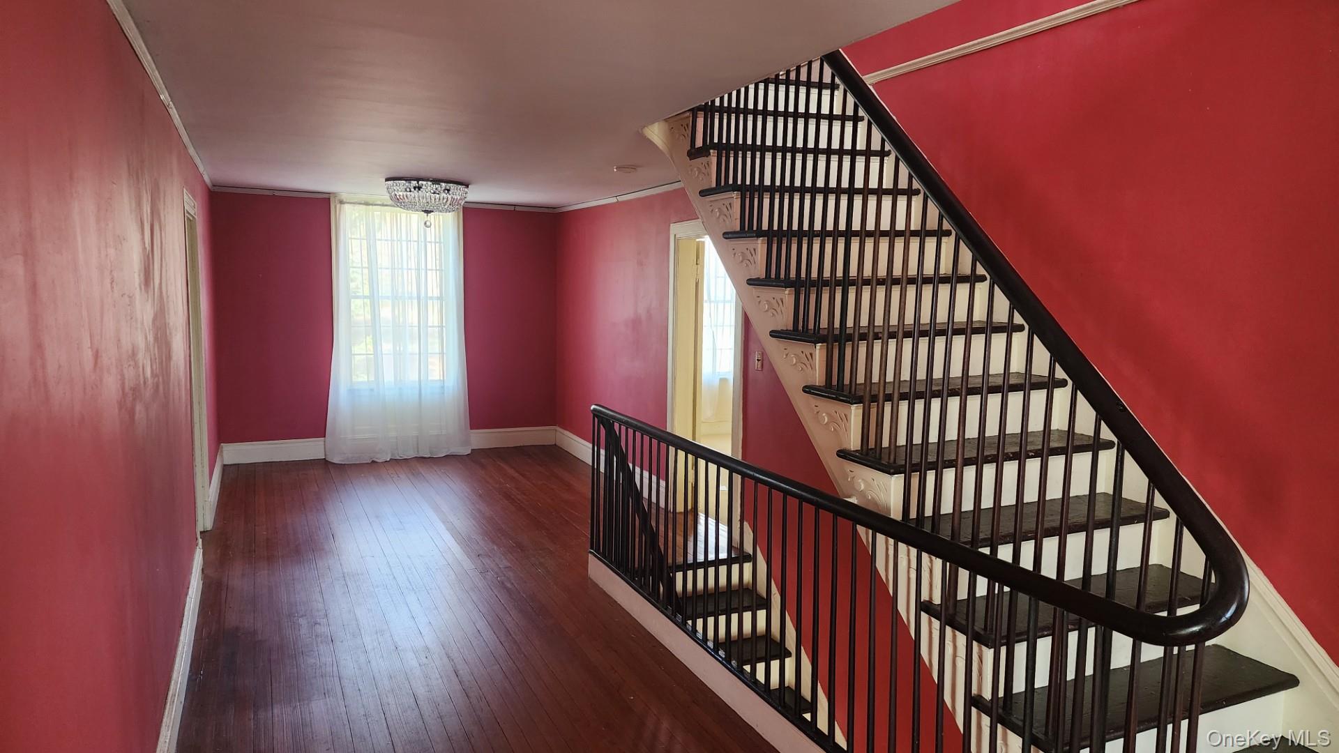 175 Waccabuc Road Goldens Bridge, NY 10526 - Photo 20 of 36 Stairs with crown molding and hardwood / wood-style floors